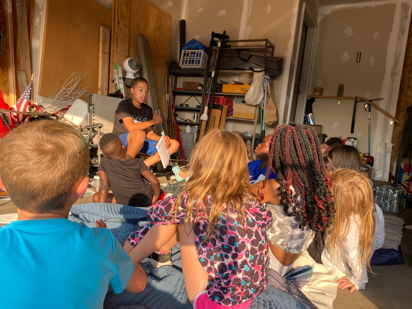 Group of children listening to a presentation